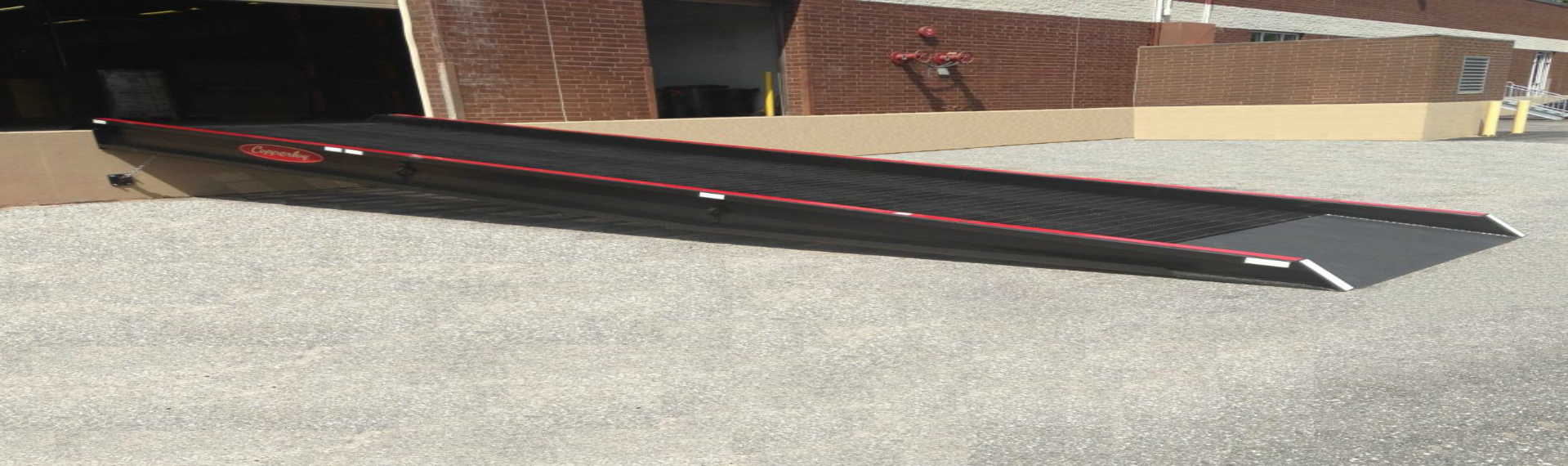 Dock to ground ramps - image of loading dock ramp